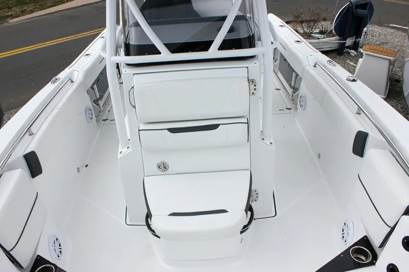 Irish Eyes Yacht Photos Pics 2023 Blackfin 252 CC boat interior with white seating and center console.