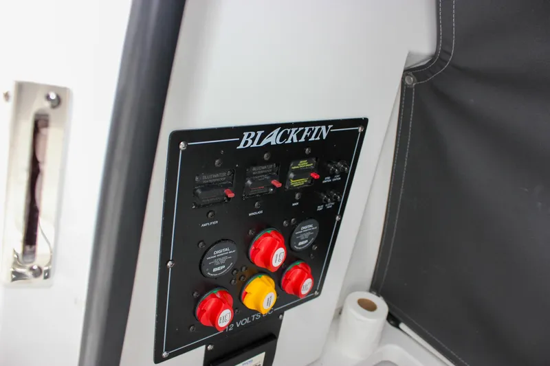 Irish Eyes Yacht Photos Pics Control panel of 2023 Blackfin 252 CC boat with switches and dials.