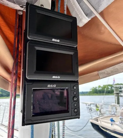 Sundog Yacht Photos Pics B&G navigation displays on a 2006 J Boats J/124 sailboat, docked by the water.