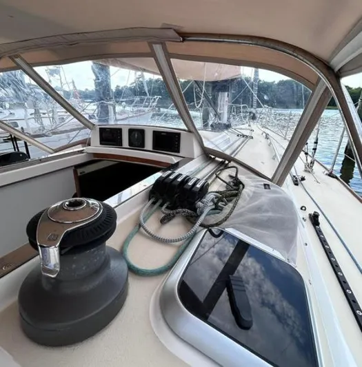 Sundog Yacht Photos Pics 2006 J Boats J/124 sailboat cockpit with winch, ropes, and navigation instruments.