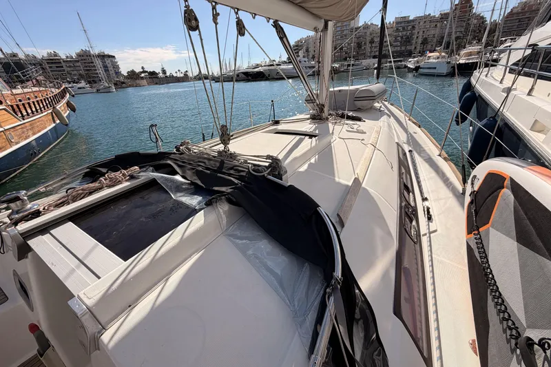  Yacht Photos Pics Beneteau Oceanis 370 sailboat docked in marina, 2013 model, sunny day.