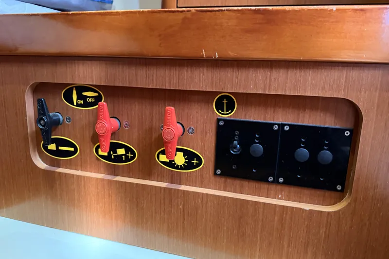  Yacht Photos Pics Control panel on a 2013 Beneteau Oceanis 370 sailboat with labeled switches.