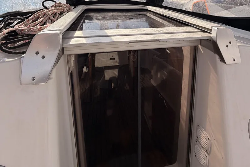  Yacht Photos Pics Beneteau Oceanis 370 yacht cockpit entrance with sliding door, 2013 model.