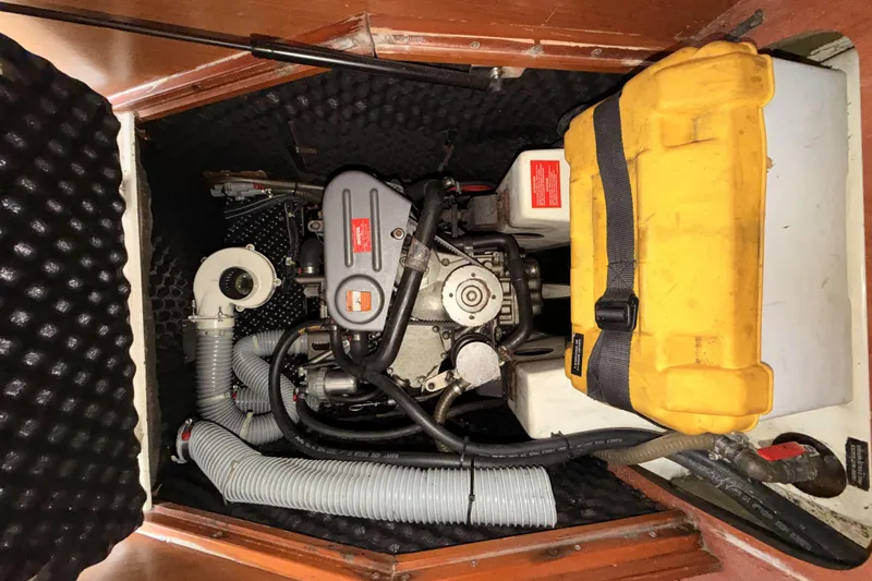  Yacht Photos Pics Engine compartment of 2013 Beneteau Oceanis 370 sailboat with yellow storage case.