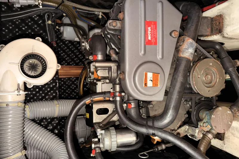  Yacht Photos Pics Engine compartment of a 2013 Beneteau Oceanis 370 sailboat, showcasing mechanical components.