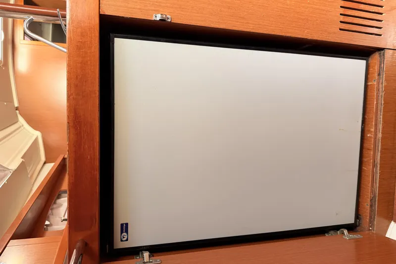  Yacht Photos Pics Beneteau Oceanis 370 2013 interior cabinet with closed white door.