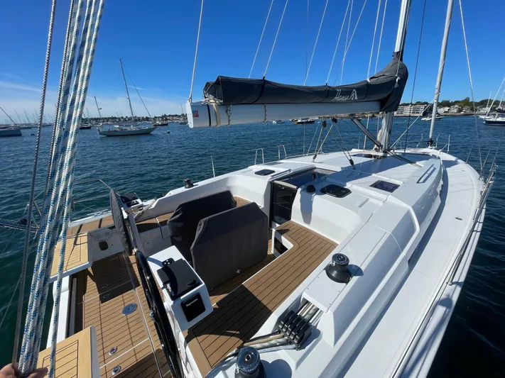 In Stock Yacht Photos Pics 2024 Hanse 410 sailboat on calm water, featuring sleek deck design and modern rigging.