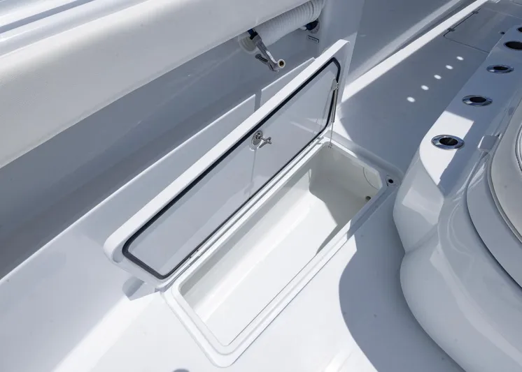  Yacht Photos Pics Open storage compartment on 2026 Invincible 33 Catamaran boat deck.