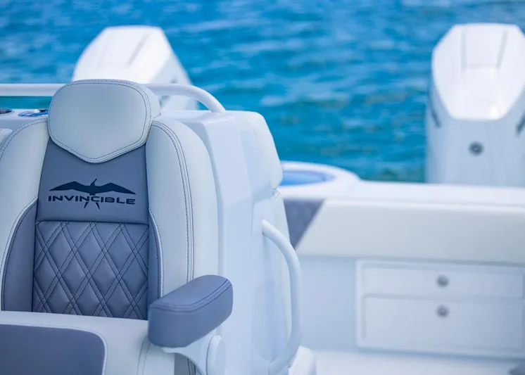  Yacht Photos Pics Invincible 33 Catamaran 2026 seat detail with ocean backdrop.