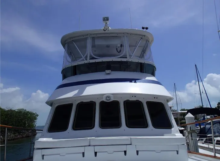 Southern Cross Yacht Photos Pics 1987 Tayana 45 Expedition Trawler docked under clear blue sky.