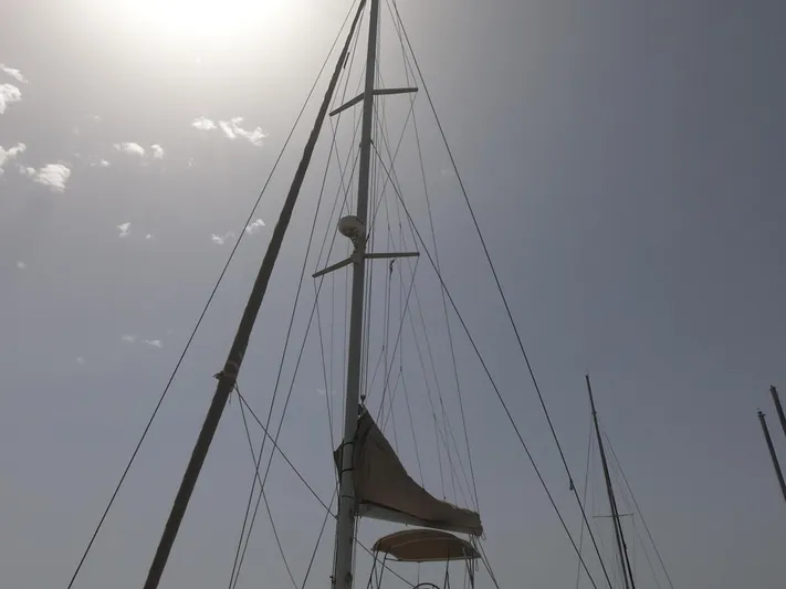  Yacht Photos Pics Mast of 2009 Lagoon 440 sailboat against a bright sky.