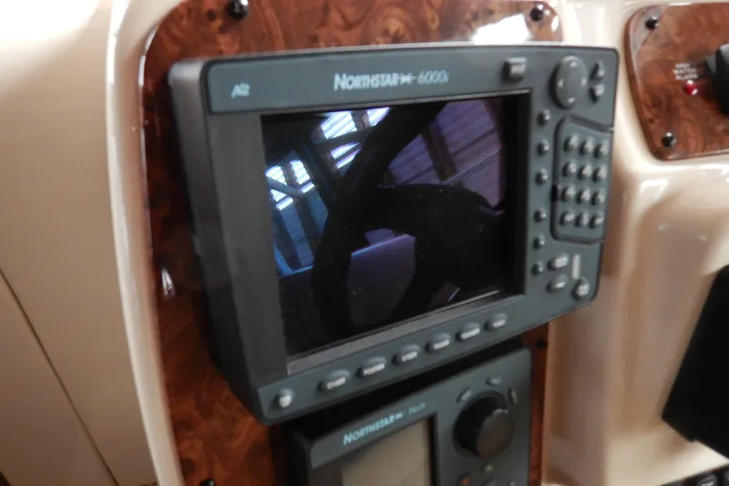 Odyssey Yacht Photos Pics Navigation system on 2008 Meridian 411 Sedan boat dashboard.
