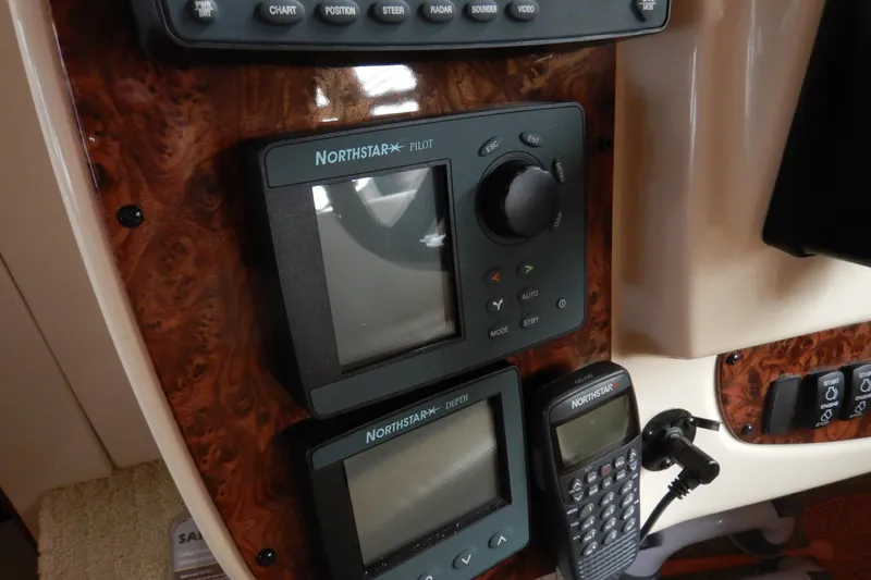 Odyssey Yacht Photos Pics Control panel of a 2008 Meridian 411 Sedan with Northstar navigation equipment.
