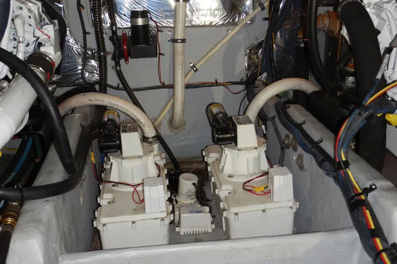 Odyssey Yacht Photos Pics Engine room of 2008 Meridian 411 Sedan with mechanical components and wiring.