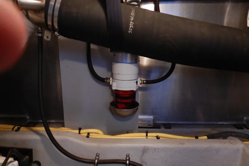 Odyssey Yacht Photos Pics Engine compartment of 2008 Meridian 411 Sedan with visible hoses and fittings.