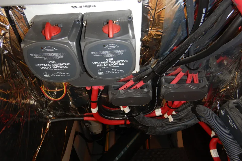 Odyssey Yacht Photos Pics Electrical system with voltage sensitive relay modules in a 2008 Meridian 411 Sedan.