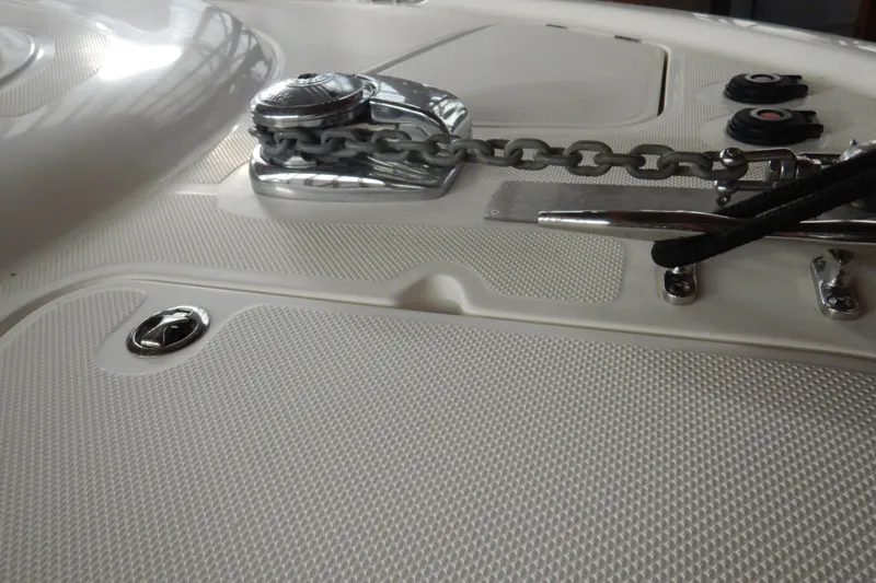 Odyssey Yacht Photos Pics Close-up of 2008 Meridian 411 Sedan boat deck with anchor chain and cleat.
