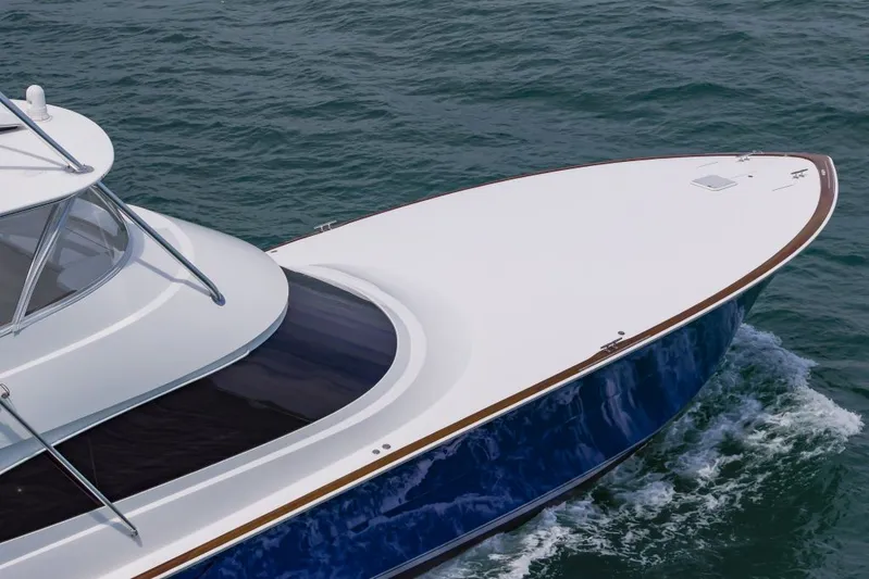 Safari Yacht Photos Pics 2022 Viking 72 Convertible yacht cruising on open water.