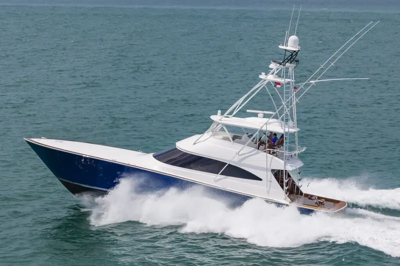 Safari Yacht Photos Pics 2022 Viking 72 Convertible yacht cruising on open water.