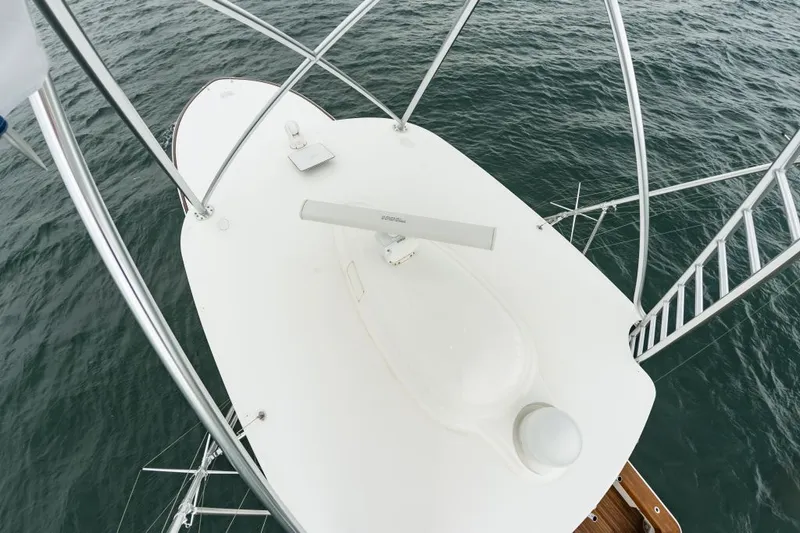 Safari Yacht Photos Pics Aerial view of 2022 Viking 72 Convertible yacht's upper deck and radar equipment.