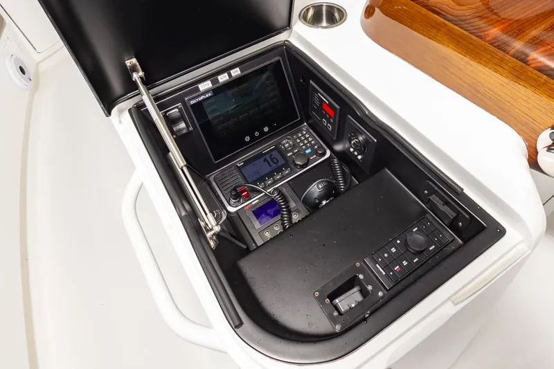 Safari Yacht Photos Pics Control panel of 2022 Viking 72 Convertible yacht with advanced navigation equipment.