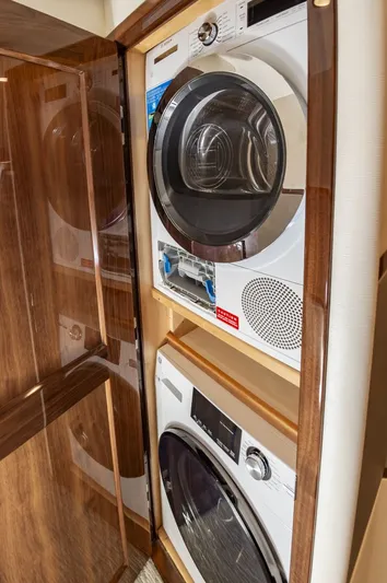 Safari Yacht Photos Pics Stacked washer and dryer in 2022 Viking 72 Convertible yacht.