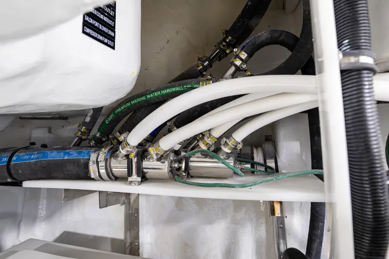 Oasis Yacht Photos Pics Engine room piping and hoses in a 2024 Northwest 55 model boat.