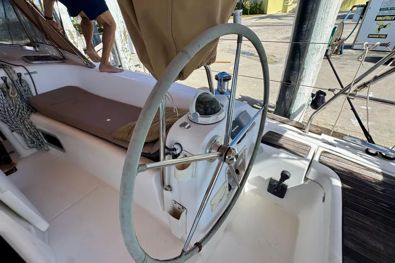  Yacht Photos Pics 2008 Beneteau Oceanis 40 sailboat cockpit with steering wheel and navigation equipment.