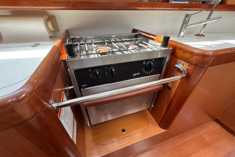 Yacht Photos Pics Galley kitchen in 2008 Beneteau Oceanis 40 sailboat with stove and sink.