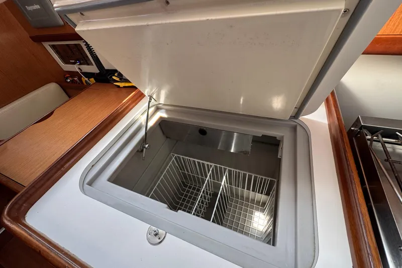  Yacht Photos Pics Open freezer compartment in 2008 Beneteau Oceanis 40 yacht kitchen interior.