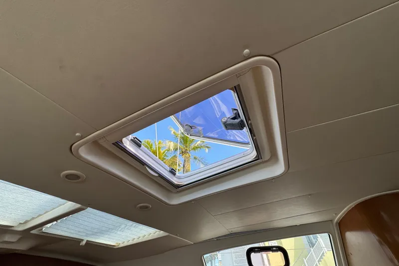  Yacht Photos Pics Interior view of 2008 Beneteau Oceanis 40 yacht with open ceiling hatch.