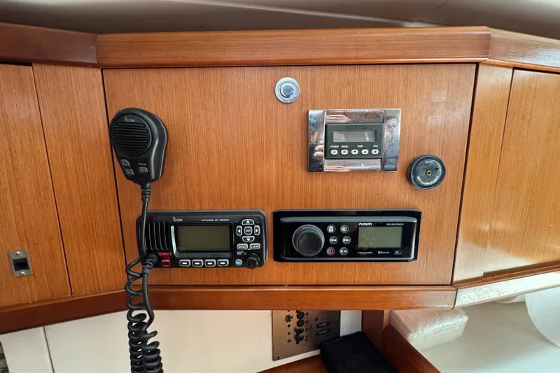  Yacht Photos Pics Control panel on a 2008 Beneteau Oceanis 40 yacht with radio and navigation equipment.