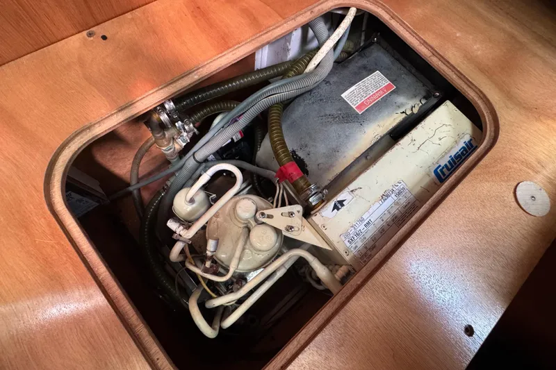  Yacht Photos Pics Engine compartment of a 2008 Beneteau Oceanis 40 sailboat, featuring mechanical components.