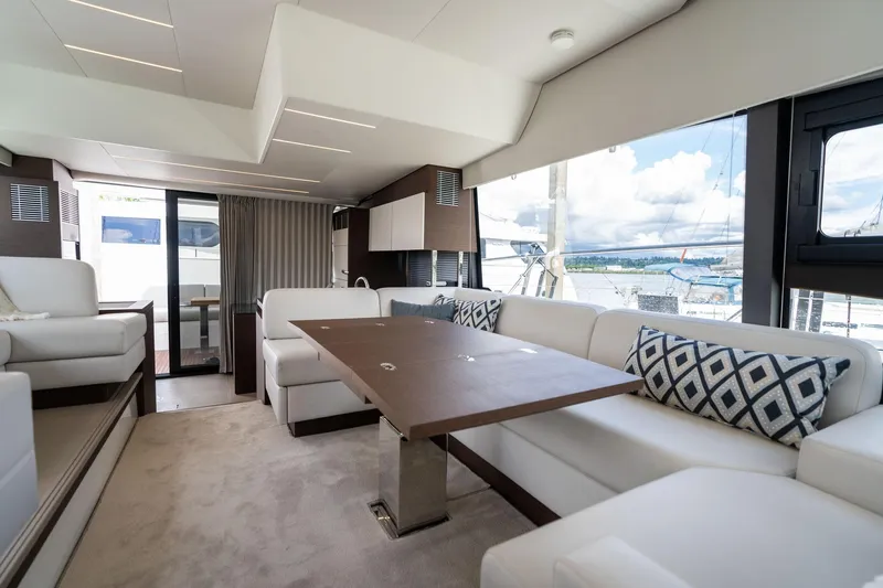  Yacht Photos Pics Luxurious interior of 2022 Prestige 520 yacht with elegant seating and modern design.
