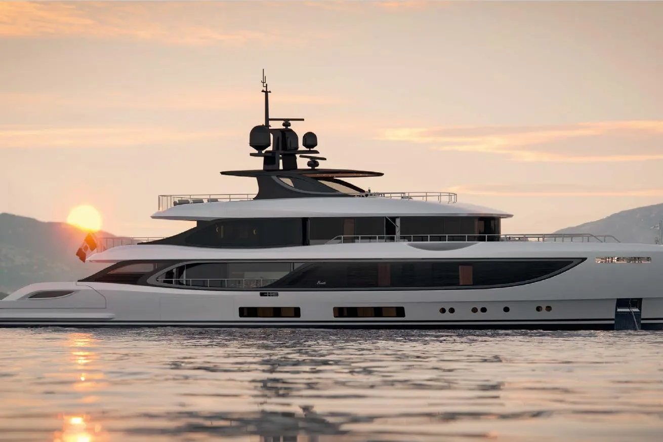 Luxury Benetti Oasis 42M yacht at sunset, 2028 model, on serene waters.