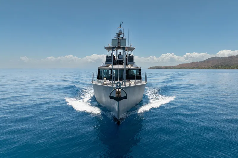 Toccata Yacht Photos Pics 2011 Circa Marine FPB64 yacht cruising on open sea under clear blue sky.