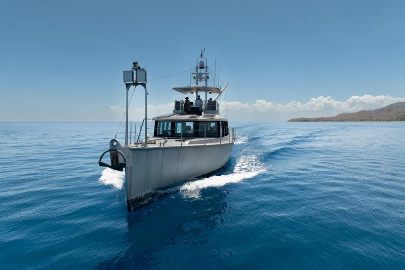 Toccata Yacht Photos Pics Circa Marine FPB64 yacht cruising on clear blue ocean, 2011 model.