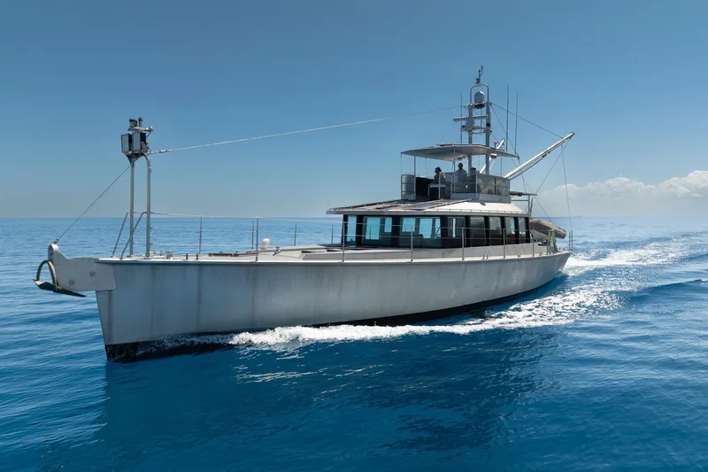 Toccata Yacht Photos Pics 2011 Circa Marine FPB64 yacht cruising on open sea under clear blue sky.