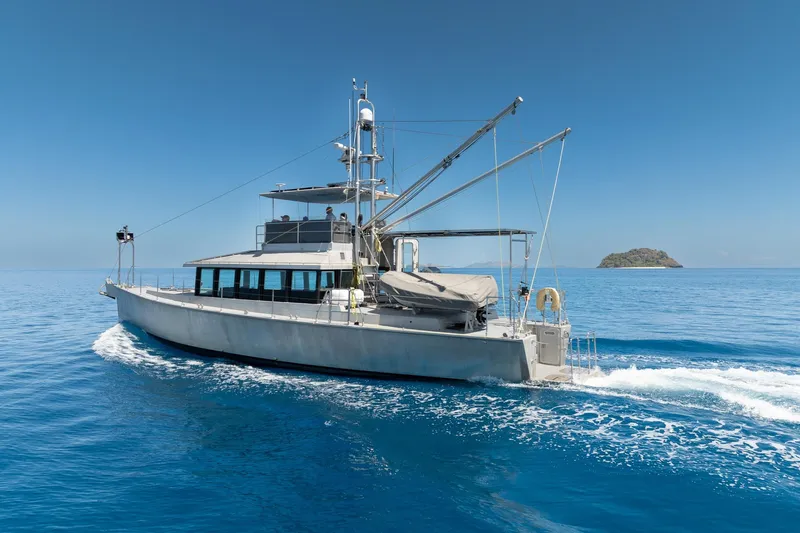 Toccata Yacht Photos Pics Circa Marine FPB64 yacht cruising on clear blue ocean, 2011 model.