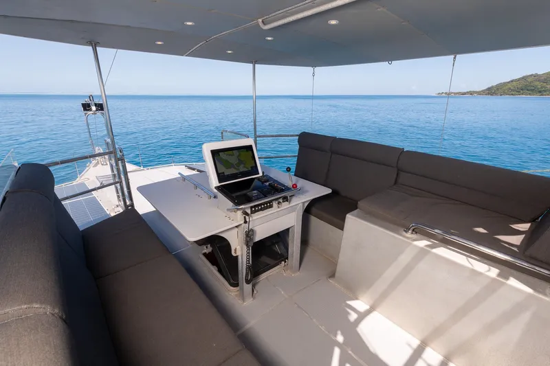 Toccata Yacht Photos Pics Luxurious 2011 Circa Marine FPB64 yacht interior with navigation equipment and ocean view.