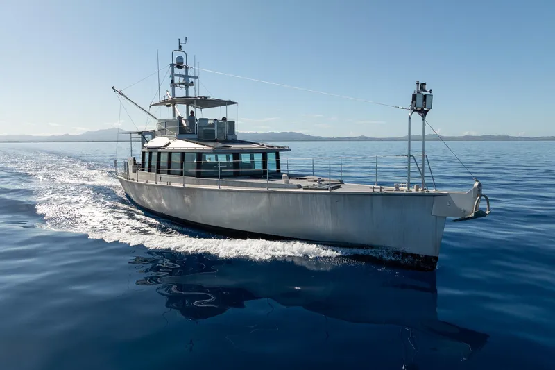 Toccata Yacht Photos Pics Circa Marine FPB64 yacht cruising on calm ocean waters, 2011 model.