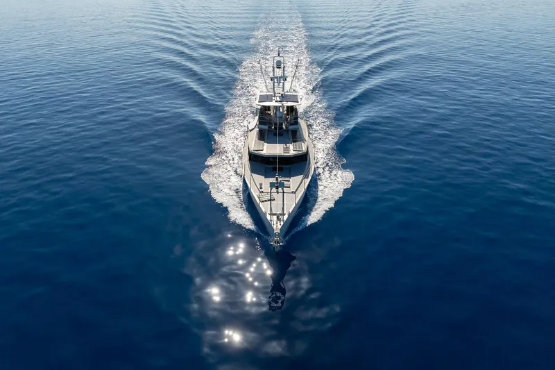 Toccata Yacht Photos Pics Circa Marine FPB64 yacht cruising on calm blue ocean, 2011 model.