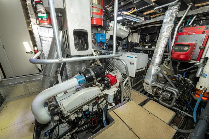 Toccata Yacht Photos Pics Engine room of 2011 Circa Marine FPB64 yacht, showcasing complex machinery and equipment.