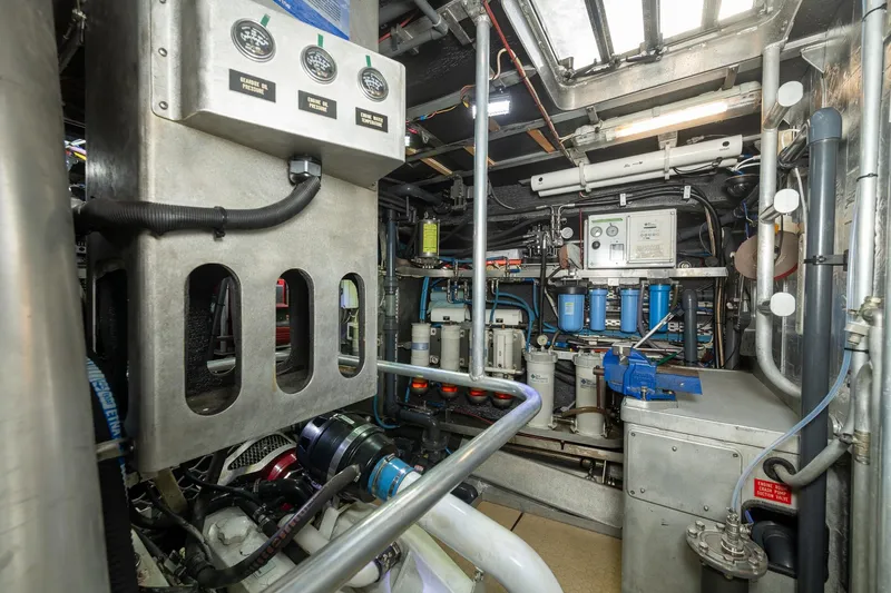 Toccata Yacht Photos Pics Engine room of 2011 Circa Marine FPB64 yacht, showcasing complex machinery and control panels.