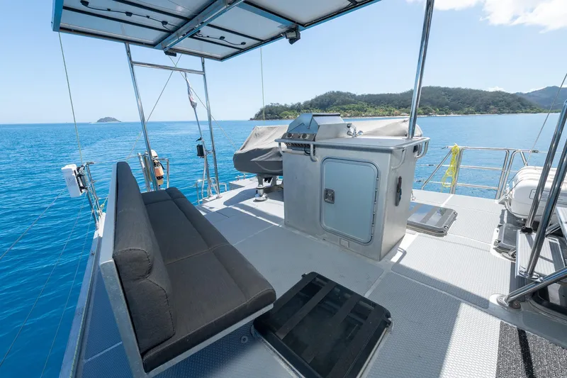 Toccata Yacht Photos Pics 2011 Circa Marine FPB64 yacht deck with seating and ocean view.