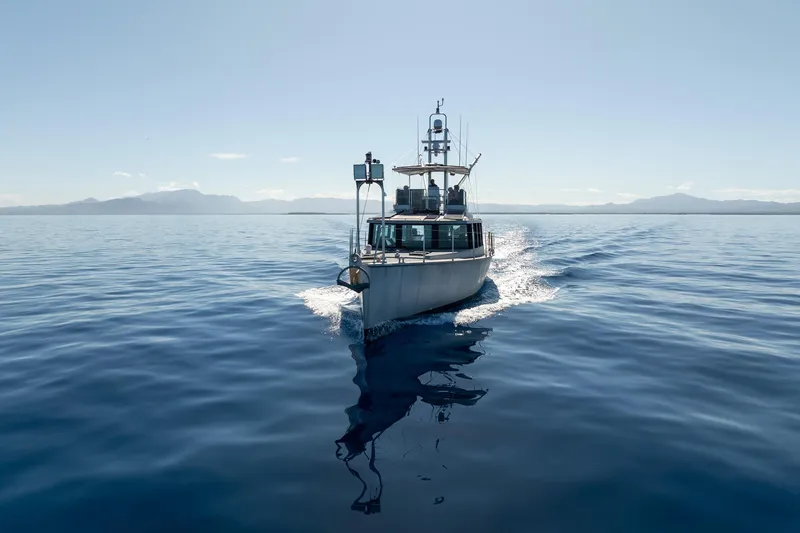 Toccata Yacht Photos Pics Circa Marine FPB64 yacht cruising on calm ocean waters, 2011 model.