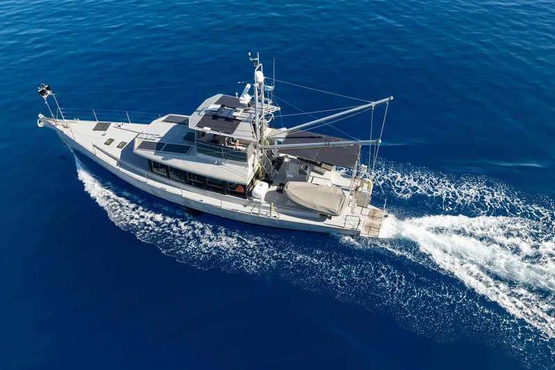 Toccata Yacht Photos Pics Circa Marine FPB64 yacht cruising on open blue sea, 2011 model.