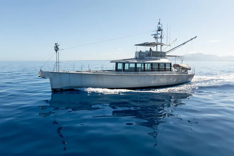 Toccata Yacht Photos Pics 2011 Circa Marine FPB64 yacht cruising on calm blue ocean waters.