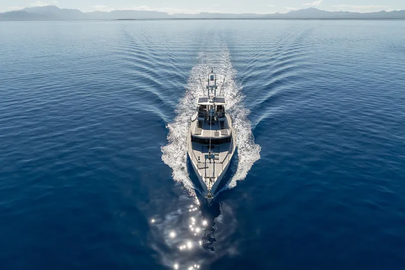 Toccata Yacht Photos Pics Circa Marine FPB64 yacht cruising on calm blue ocean, 2011 model.