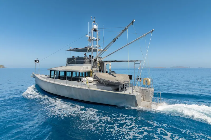 Toccata Yacht Photos Pics Circa Marine FPB64 yacht cruising on clear blue ocean, 2011 model.